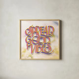 Spread Good Vibes by Sara Zieve Miller. Shown in a natural wood glass frame for a timeless modern aesthetic. Available as an archival giclee rolled canvas, fine art paper, or poster print. SKU 58212a.