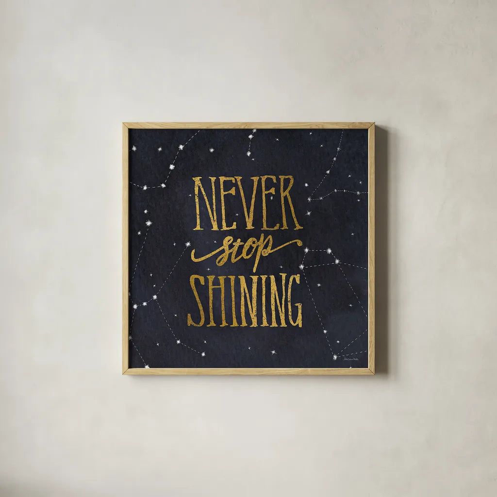 Starry Words II v.3 Gold by Sara Zieve Miller. Shown in a natural wood glass frame for a timeless modern aesthetic. Available as an archival giclee rolled canvas, fine art paper, or poster print. SKU 21672a.