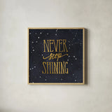 Starry Words II v.3 Gold by Sara Zieve Miller. Shown in a natural wood glass frame for a timeless modern aesthetic. Available as an archival giclee rolled canvas, fine art paper, or poster print. SKU 21672a.