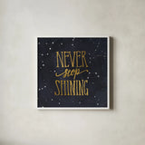 Starry Words II v.3 Gold by Sara Zieve Miller. Shown in a crisp white glass frame for a clean and minimalist style. Available as an archival giclee rolled canvas, fine art paper, or poster print. SKU 21672a.