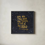 Starry Words III Gold by Sara Zieve Miller. Shown in a sleek black glass frame for a contemporary gallery look. Available as an archival giclee rolled canvas, fine art paper, or poster print. SKU 21670a.