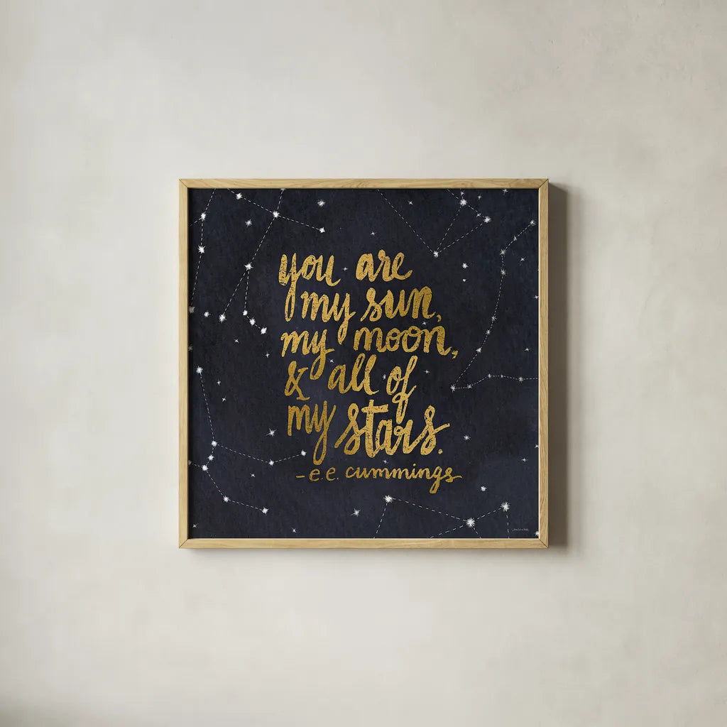 Starry Words III Gold by Sara Zieve Miller. Shown in a natural wood glass frame for a timeless modern aesthetic. Available as an archival giclee rolled canvas, fine art paper, or poster print. SKU 21670a.