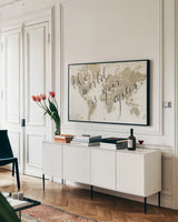 The World is Your Oyster by Sara Zieve Miller. shown as a framed stretched canvas in a living room above a console. Available as a archival giclee rolled canvas, fine art paper, or poster print. SKU 16779i.