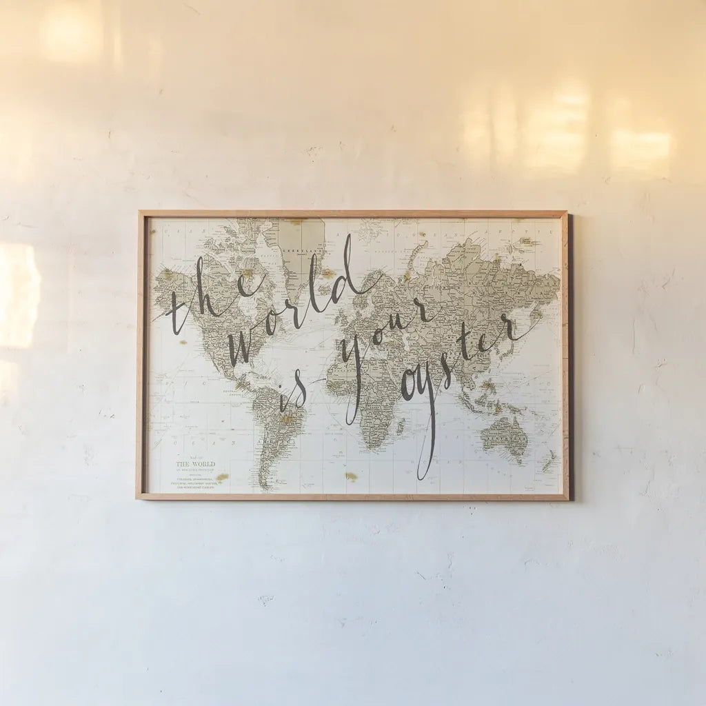 The World is Your Oyster by Sara Zieve Miller. shown as a paper print in a natural frame. Available as a archival giclee rolled canvas, fine art paper, or poster print. SKU 16779i.