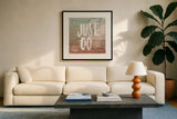 World Traveler II Neutral by Sara Zieve Miller. Displayed in a glass frame with matte in a clean modern living room. Available as an archival giclee rolled canvas, fine art paper, or poster print. SKU 75051a.