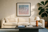 World Traveler Wander by Sara Zieve Miller. Displayed in a glass frame with matte in a clean modern living room. Available as an archival giclee rolled canvas, fine art paper, or poster print. SKU 27424a.