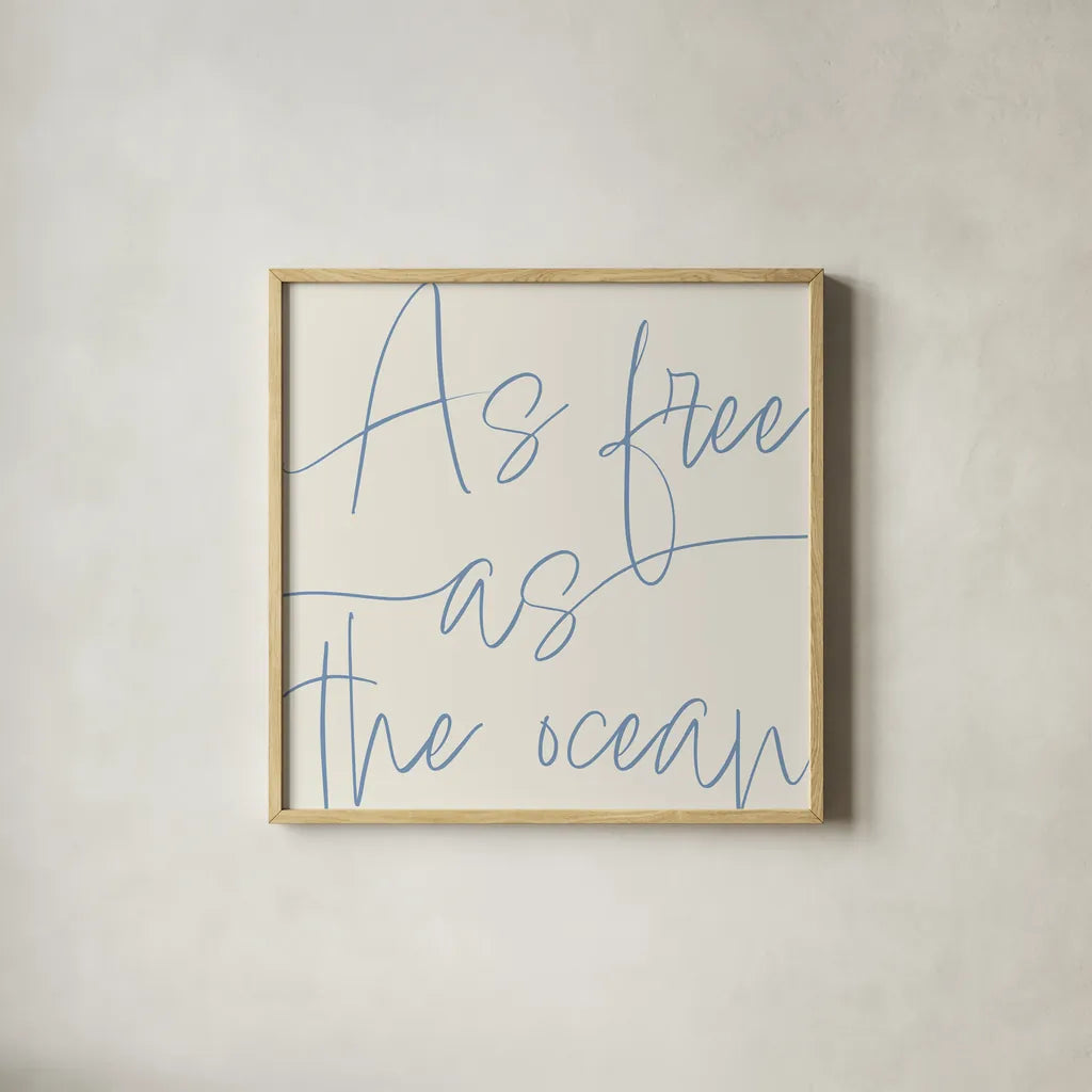 By the Beach I Light by Sarah Adams. Shown in a natural wood glass frame for a timeless modern aesthetic. Available as an archival giclee rolled canvas, fine art paper, or poster print. SKU 83849a.