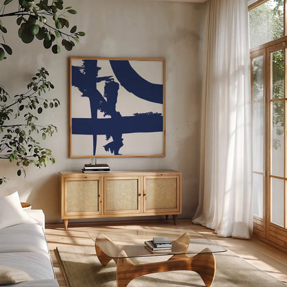 Crossing Paths II Cobalt by Sarah Adams. Shown in a natural wood frame in a cozy modern living room. Available as an archival giclee rolled canvas, fine art paper, or poster print. SKU 67606a.