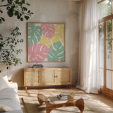 Monstera II Bright on White by Sarah Adams. Shown in a natural wood frame in a cozy modern living room. Available as an archival giclee rolled canvas, fine art paper, or poster print. SKU 33648a.