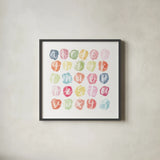 Watercolor Alphabet by Sarah Adams. Shown in a sleek black glass frame for a contemporary gallery look. Available as an archival giclee rolled canvas, fine art paper, or poster print. SKU 33404a.