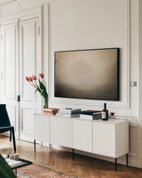 Misty Lions by Sharon Vardy. shown as a framed stretched canvas in a living room above a console. Available as a archival giclee rolled canvas, fine art paper, or poster print. SKU 92670i.
