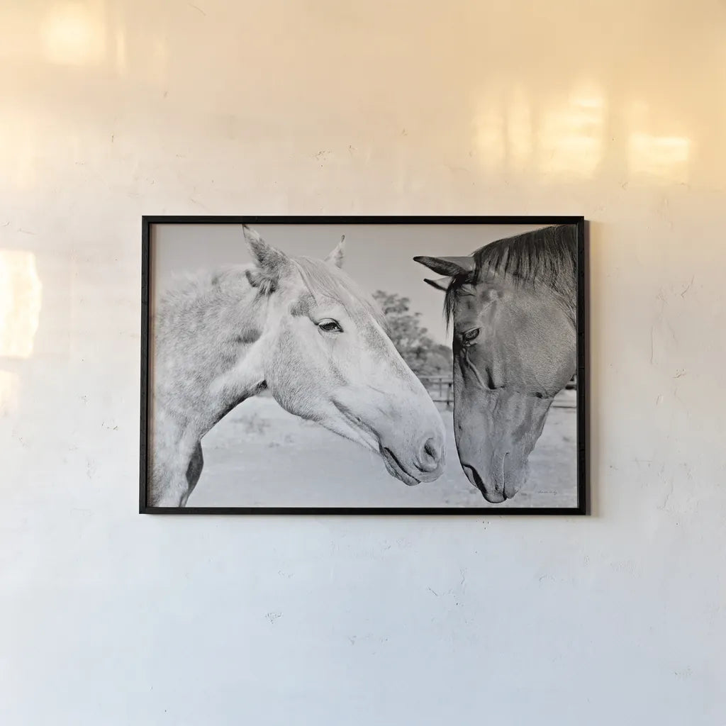 Two Horses BW by Sharon Vardy. shown as a paper print in a black flame. Available as a archival giclee rolled canvas, fine art paper, or poster print. SKU 92185i.