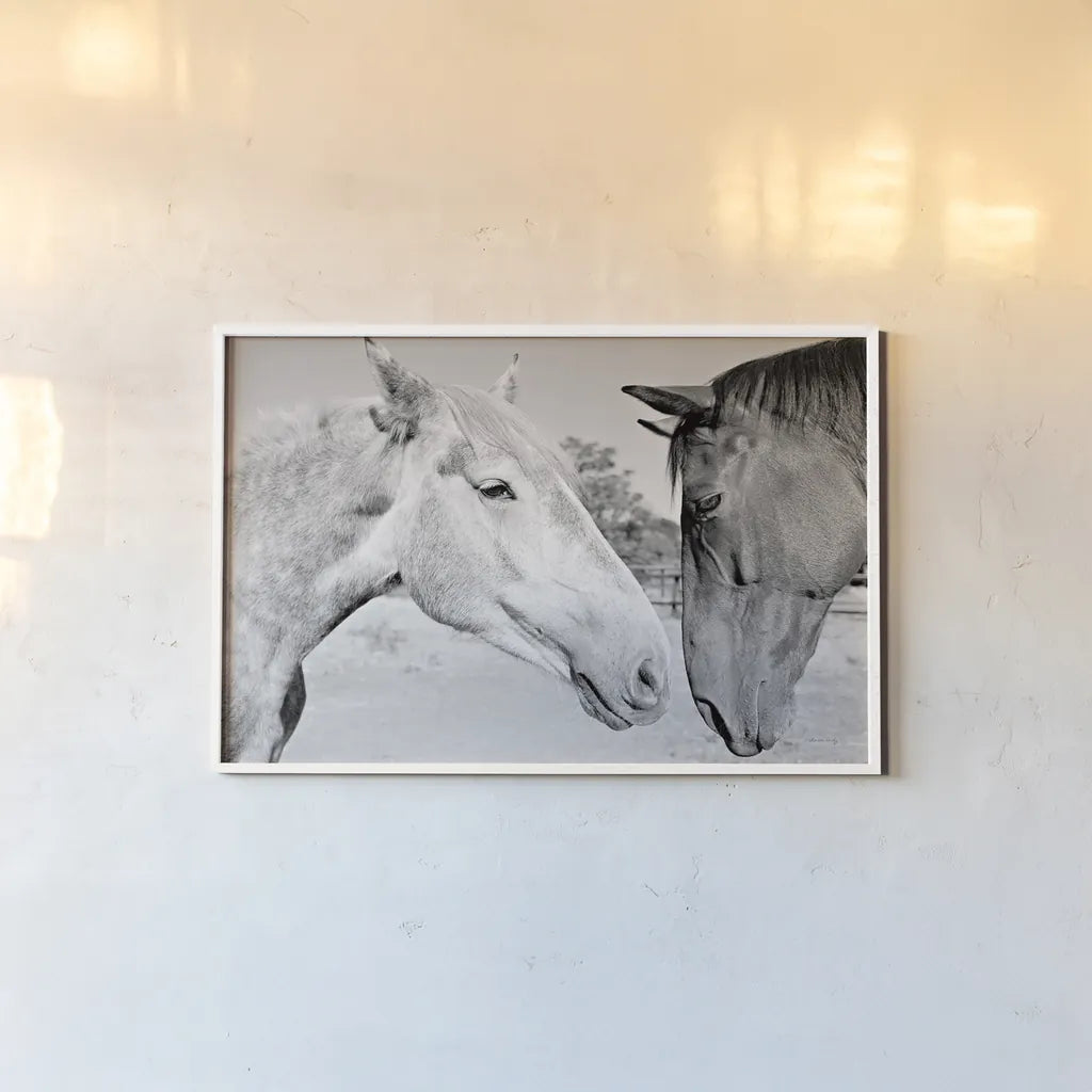 Two Horses BW by Sharon Vardy. shown as a paper print in a white frame. Available as a archival giclee rolled canvas, fine art paper, or poster print. SKU 92185i.