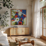 4th of July by Shirley Novak. Shown in a natural wood frame in a cozy modern living room. Available as an archival giclee rolled canvas, fine art paper, or poster print. SKU 91262a.