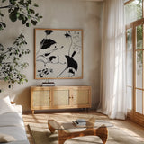 Abstract Garden II by Shirley Novak. Shown in a natural wood frame in a cozy modern living room. Available as an archival giclee rolled canvas, fine art paper, or poster print. SKU 89178a.