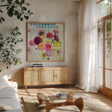 Color Chart II by Shirley Novak. Shown in a natural wood frame in a cozy modern living room. Available as an archival giclee rolled canvas, fine art paper, or poster print. SKU 98494a.