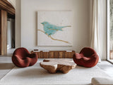 Gilded Bird I Teal by Shirley Novak. Shown as extra-large giant wall art in a modern living room. Available as an archival giclee rolled canvas, fine art paper, or poster print. SKU 36132a.