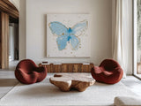 Gilded Butterflies III by Shirley Novak. Shown as extra-large giant wall art in a modern living room. Available as an archival giclee rolled canvas, fine art paper, or poster print. SKU 30834a.