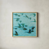 Gilded Flight Blue Green by Shirley Novak. Shown in a natural wood glass frame for a timeless modern aesthetic. Available as an archival giclee rolled canvas, fine art paper, or poster print. SKU 89024a.