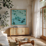 Gilded Flight Blue Green by Shirley Novak. Shown in a natural wood frame in a cozy modern living room. Available as an archival giclee rolled canvas, fine art paper, or poster print. SKU 89024a.