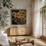 Gold Black Line Poppies I by Shirley Novak. Shown in a natural wood frame in a cozy modern living room. Available as an archival giclee rolled canvas, fine art paper, or poster print. SKU 31254a.