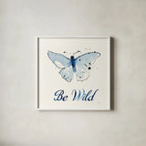 Independent Blooms Blue IX by Shirley Novak. Shown in a crisp white glass frame for a clean and minimalist style. Available as an archival giclee rolled canvas, fine art paper, or poster print. SKU 34123a.