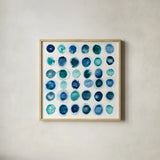 Roundabout Blue by Shirley Novak. Shown in a natural wood glass frame for a timeless modern aesthetic. Available as an archival giclee rolled canvas, fine art paper, or poster print. SKU 23829a.