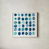 Roundabout Blue by Shirley Novak. Shown in a crisp white glass frame for a clean and minimalist style. Available as an archival giclee rolled canvas, fine art paper, or poster print. SKU 23829a.