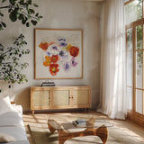 Spring Fleurs by Shirley Novak. Shown in a natural wood frame in a cozy modern living room. Available as an archival giclee rolled canvas, fine art paper, or poster print. SKU 25017a.