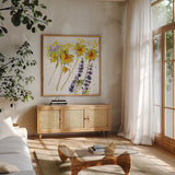 Wild Sunflowers and Lupine by Shirley Novak. Shown in a natural wood frame in a cozy modern living room. Available as an archival giclee rolled canvas, fine art paper, or poster print. SKU 89288a.