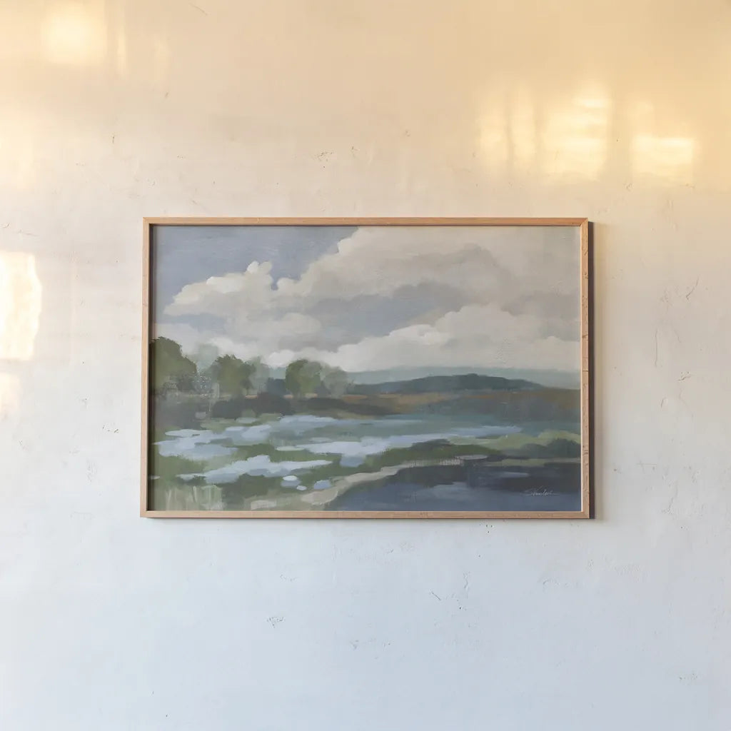  Light Blue Coastal Flowers by Silvia Vassileva. shown as a paper print in a natural frame. Available as a archival giclee rolled canvas, fine art paper, or poster print. SKU 85815i.