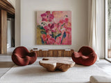 Abstract Orchid by Silvia Vassileva. Shown as extra-large giant wall art in a modern living room. Available as an archival giclee rolled canvas, fine art paper, or poster print. SKU 98019a.