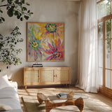 Abstracted Petals I by Silvia Vassileva. Shown in a natural wood frame in a cozy modern living room. Available as an archival giclee rolled canvas, fine art paper, or poster print. SKU 23889a.