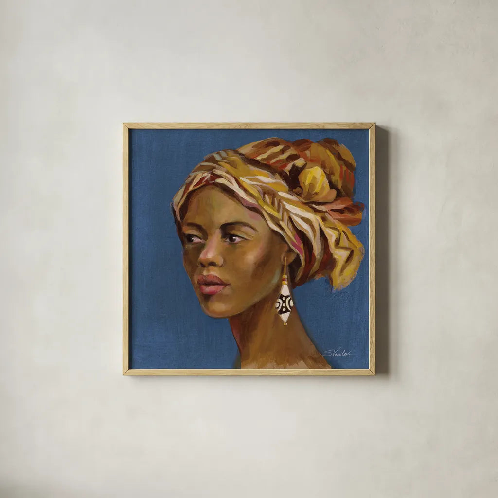 African Beauty II Blue by Silvia Vassileva. Shown in a natural wood glass frame for a timeless modern aesthetic. Available as an archival giclee rolled canvas, fine art paper, or poster print. SKU 72627a.