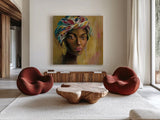 African Face I by Silvia Vassileva. Shown as extra-large giant wall art in a modern living room. Available as an archival giclee rolled canvas, fine art paper, or poster print. SKU 65247a.