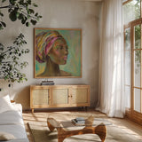 African Woman I by Silvia Vassileva. Shown in a natural wood frame in a cozy modern living room. Available as an archival giclee rolled canvas, fine art paper, or poster print. SKU 64160a.