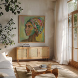 African Woman II by Silvia Vassileva. Shown in a natural wood frame in a cozy modern living room. Available as an archival giclee rolled canvas, fine art paper, or poster print. SKU 64161a.