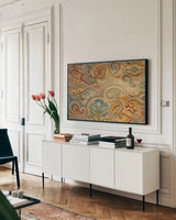 Antique Paisley by Silvia Vassileva. shown as a framed stretched canvas in a living room above a console. Available as a archival giclee rolled canvas, fine art paper, or poster print. SKU 23756i.