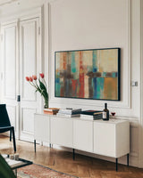 Aqua Horizon by Silvia Vassileva. shown as a framed stretched canvas in a living room above a console. Available as a archival giclee rolled canvas, fine art paper, or poster print. SKU 12945i.