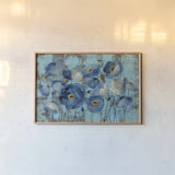Aquamarine Floral on Blue by Silvia Vassileva. shown as a paper print in a natural frame. Available as a archival giclee rolled canvas, fine art paper, or poster print. SKU 22763i.