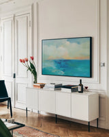 Aquarelle Sea by Silvia Vassileva. shown as a framed stretched canvas in a living room above a console. Available as a archival giclee rolled canvas, fine art paper, or poster print. SKU 79888i.