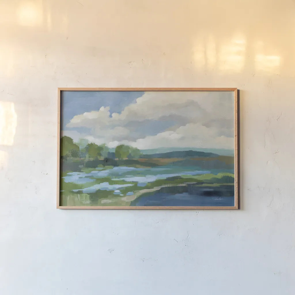 Blue Coastal Flowers by Silvia Vassileva. shown as a paper print in a natural frame. Available as a archival giclee rolled canvas, fine art paper, or poster print. SKU 82621i.