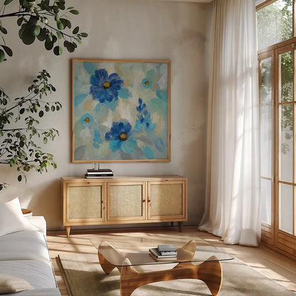 Blue Flowers Whisper II by Silvia Vassileva. Shown in a natural wood frame in a cozy modern living room. Available as an archival giclee rolled canvas, fine art paper, or poster print. SKU 28658a.