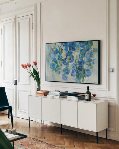 Blue Garden by Silvia Vassileva. shown as a framed stretched canvas in a living room above a console. Available as a archival giclee rolled canvas, fine art paper, or poster print. SKU 97920i.
