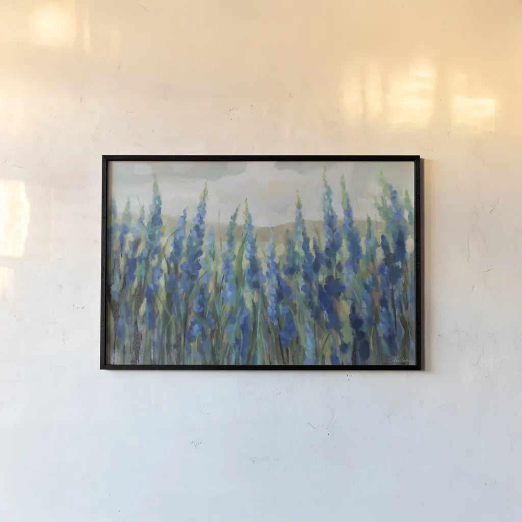 Blue Meadow by Silvia Vassileva. shown as a paper print in a black flame. Available as a archival giclee rolled canvas, fine art paper, or poster print. SKU 98567i.