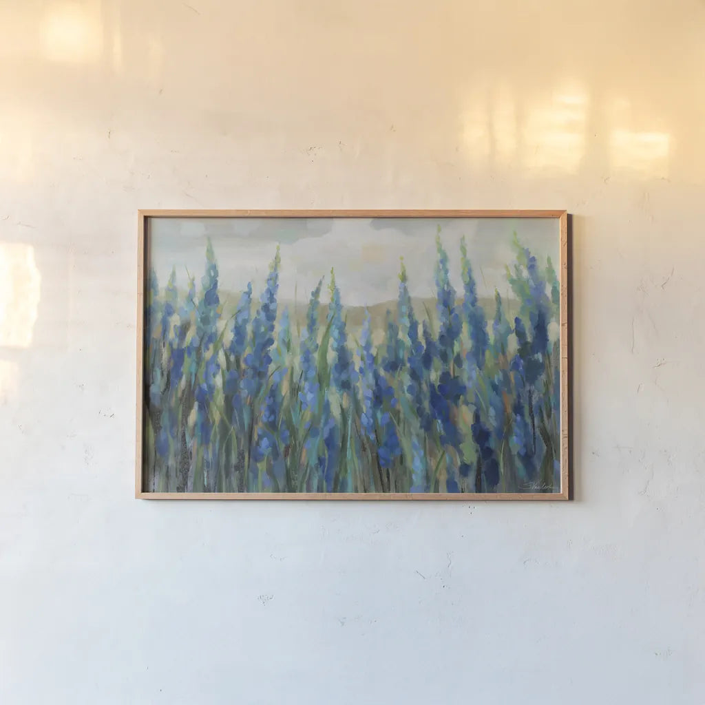 Blue Meadow by Silvia Vassileva. shown as a paper print in a natural frame. Available as a archival giclee rolled canvas, fine art paper, or poster print. SKU 98567i.