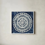Blue Textured Medallion by Silvia Vassileva. Shown in a crisp white glass frame for a clean and minimalist style. Available as an archival giclee rolled canvas, fine art paper, or poster print. SKU 57366a.