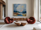 Blue Vista II by Silvia Vassileva. Shown as extra-large giant wall art in a modern living room. Available as an archival giclee rolled canvas, fine art paper, or poster print. SKU 97919a.