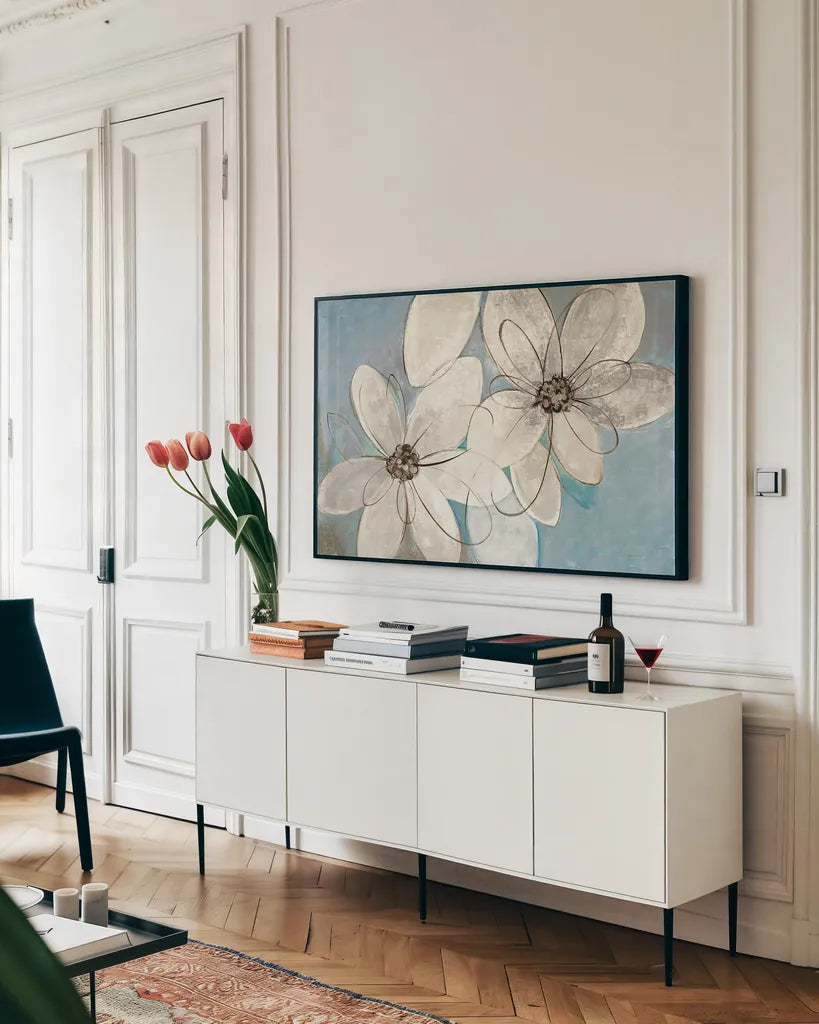 Blue and Neutral Floral by Silvia Vassileva. shown as a framed stretched canvas in a living room above a console. Available as a archival giclee rolled canvas, fine art paper, or poster print. SKU 28772i.