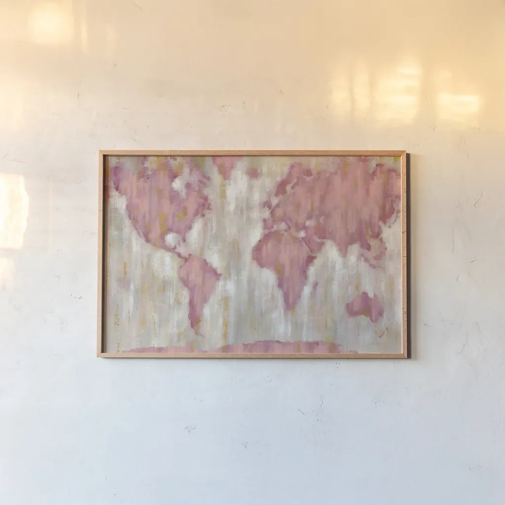 Blushing World Map v2 Crop by Silvia Vassileva. shown as a paper print in a natural frame. Available as a archival giclee rolled canvas, fine art paper, or poster print. SKU 38551i.